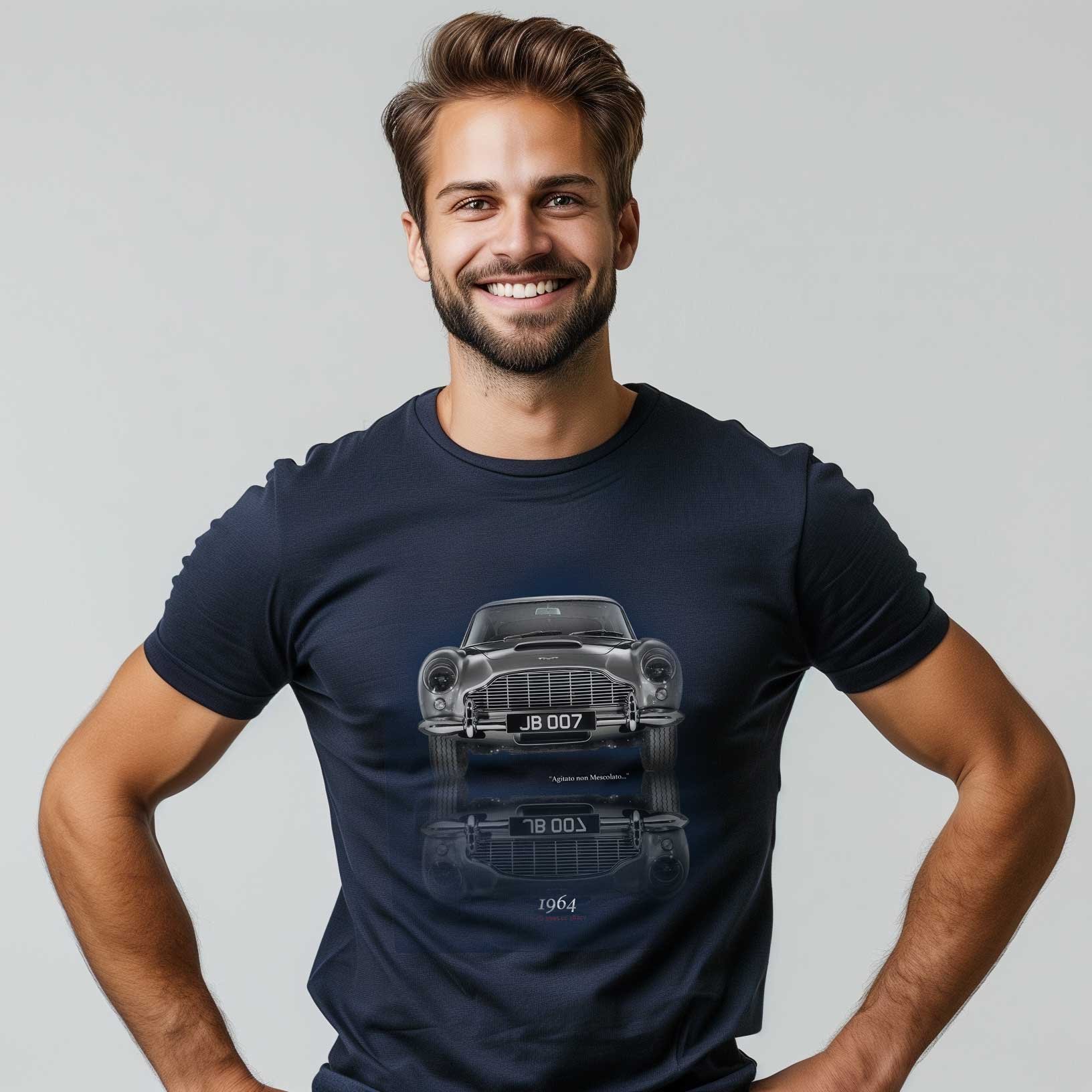 Man smiling wearing vintage car t-shirt.