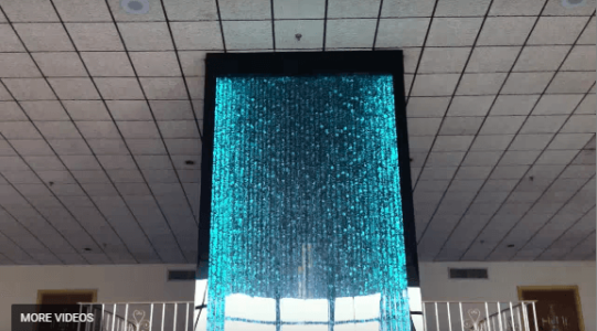 BUBBLE-WALL-WATER-FEATURE-3-STORY-CUSTOM-WATER-WALL-IN-NEW-JERSEY-WITH-GLASS-ELEVATOR