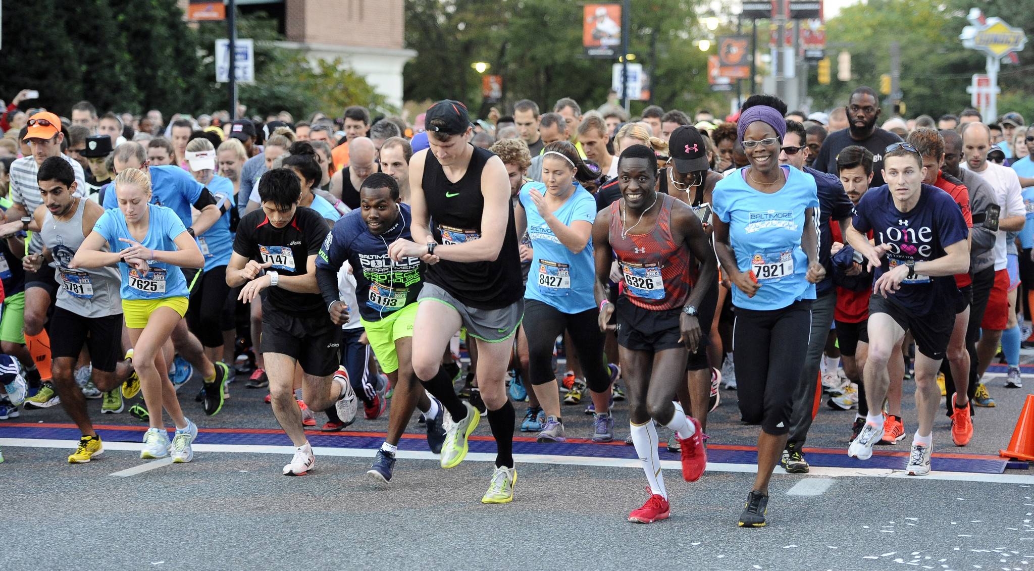 A group of people running in a marathon.