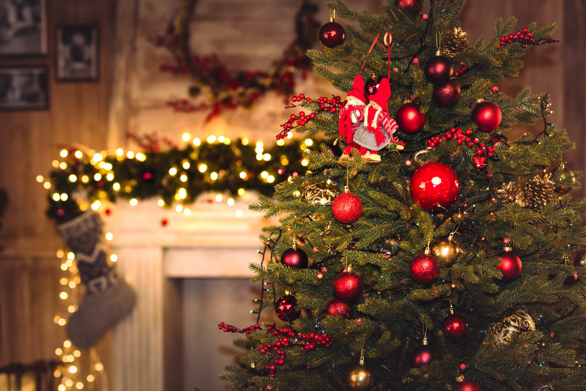 A Christmas tree adorned with red and golden ornaments, creating a festive miracle at 34 Market Place.